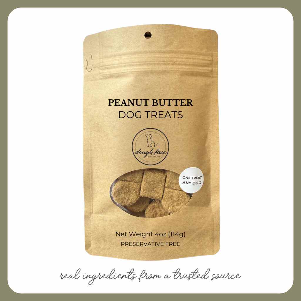 Pouch of peanut butter dog treats with visible ingredients on a white background