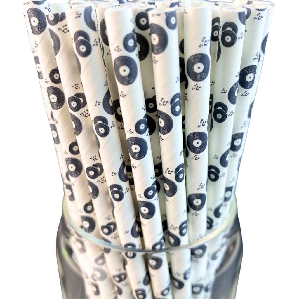 White paper straws printed with black vinyl records in clear container.