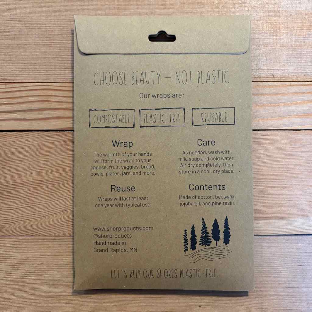 Kraft paper wrap packaging with text on a wooden surface
