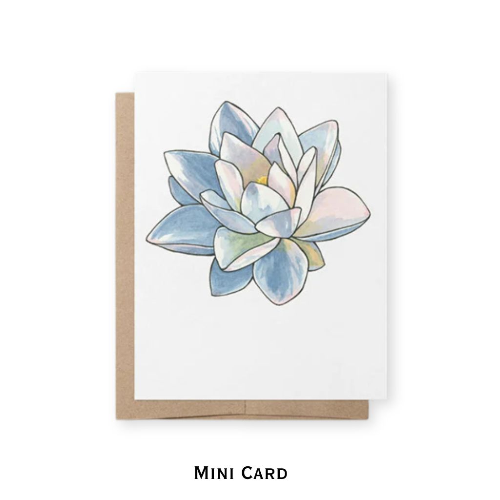 A mini greeting card with a watercolor-style blue and white lotus flower illustration on a white cardstock, shown with a brown kraft envelope behind it on a light gray background. The text 'MINI CARD' appears below.