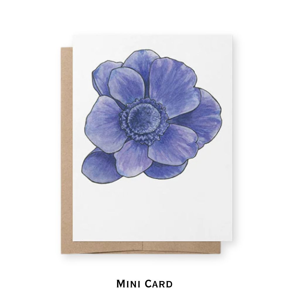 A mini greeting card with a watercolor-style blue flower illustration on a white cardstock, shown with a brown kraft envelope behind it on a white background. The text 'MINI CARD' appears below.