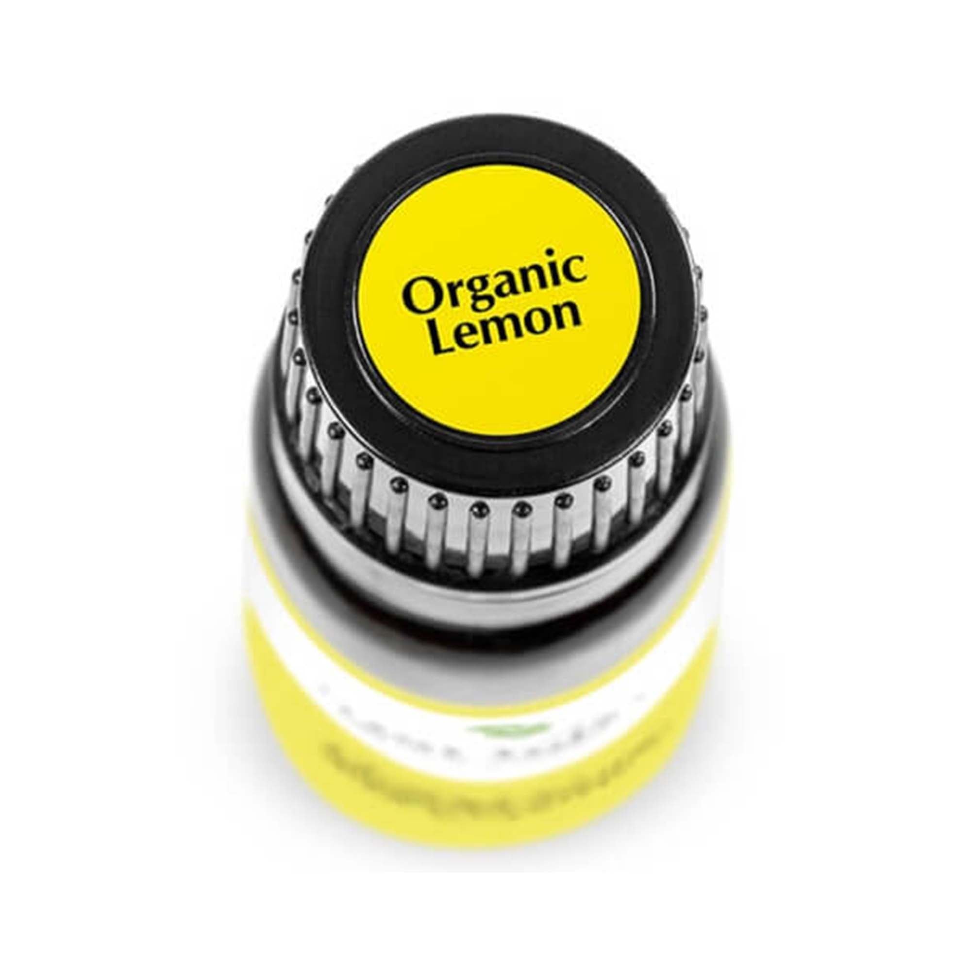 birds eye view of black bottle with yellow label, reads "organic lemon". 10 ml