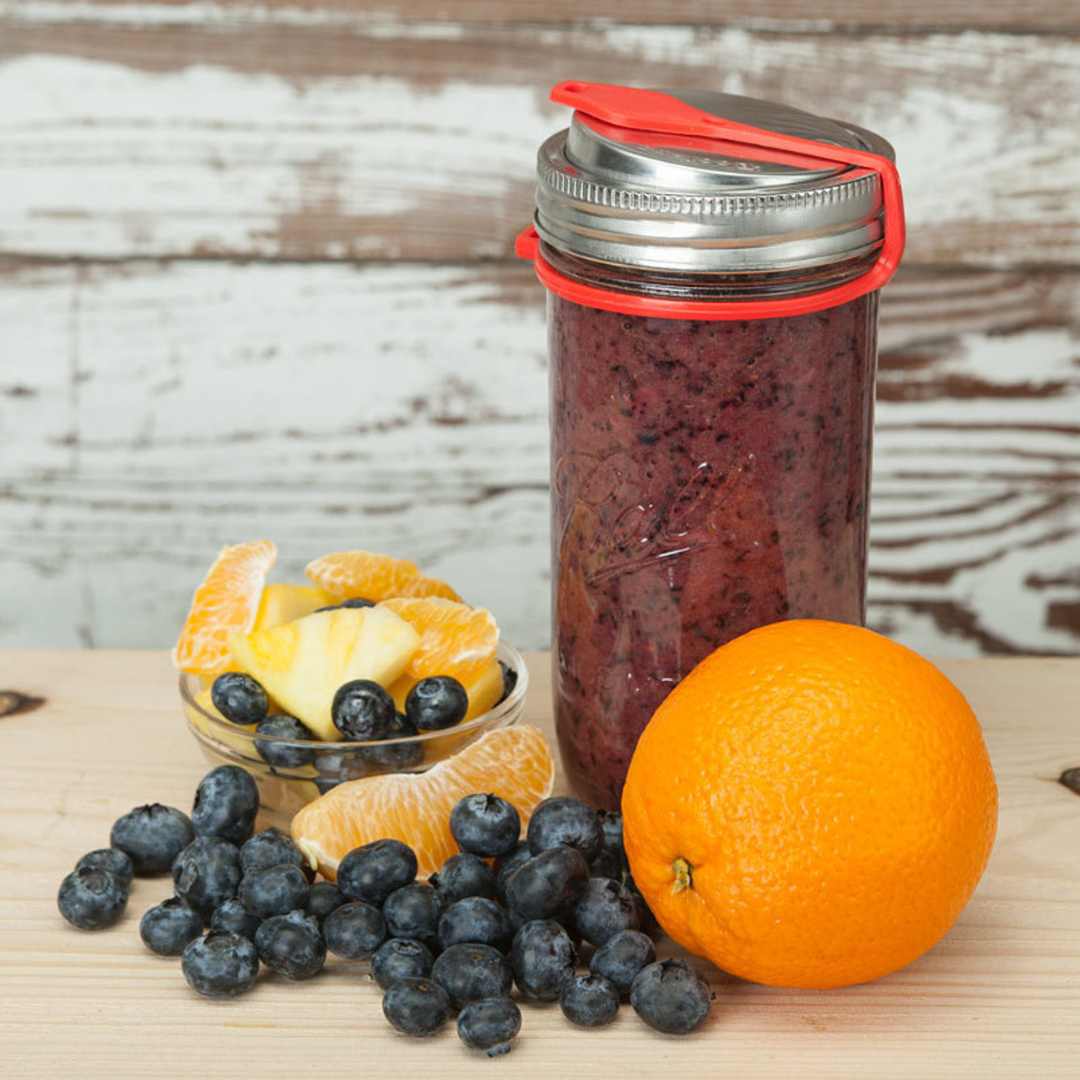 EcoJarz • Reusable drinking jar lid with red pop top.