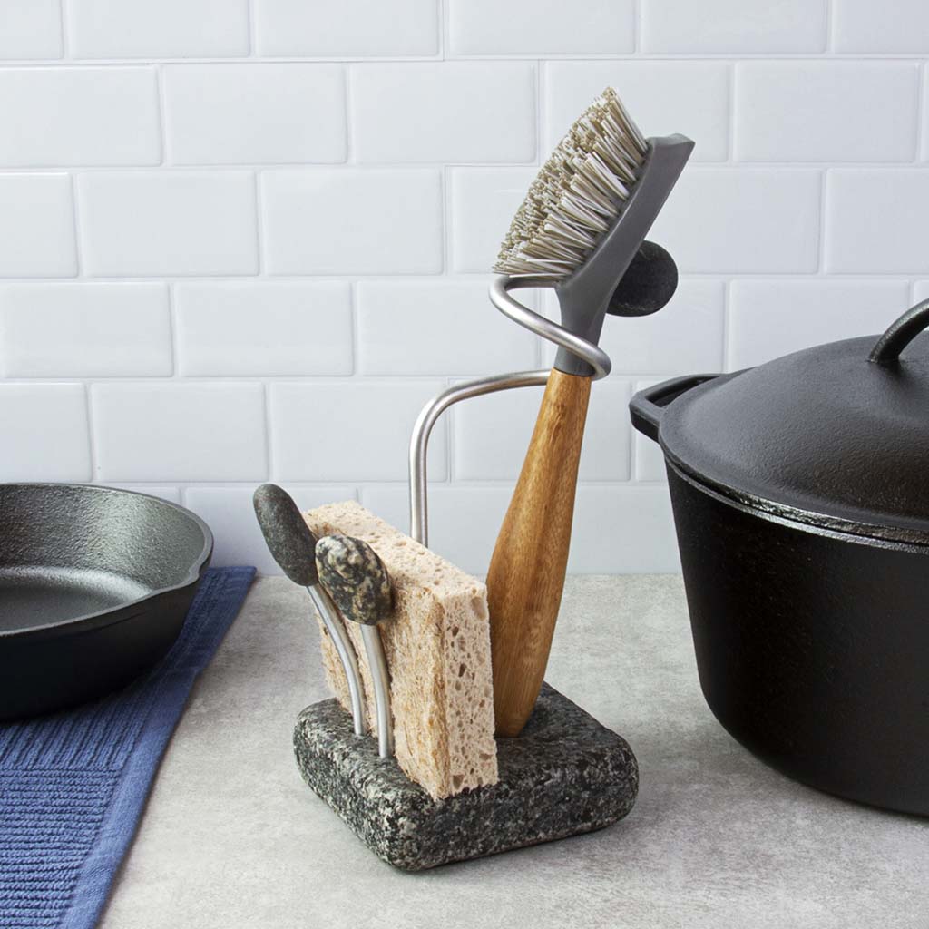 Sea Stone Reclaimed Granite Sponge & Brush Holder Combo. Reclaimed granite, brushed aluminum & hand collected smooth beach stone. 4" wide 4" deep 7.5" tall.