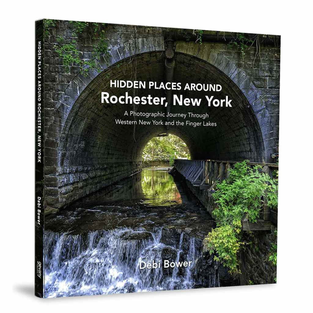 Book cover of 'Hidden Places Around Rochester, New York' with a scenic archway and water feature.