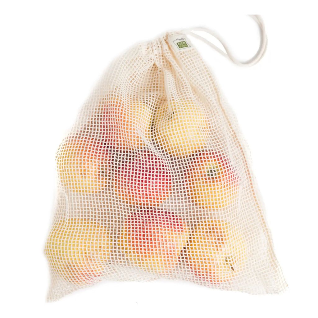 A white mesh drawstring bag filled with yellow and red apples, shown against a plain white background.