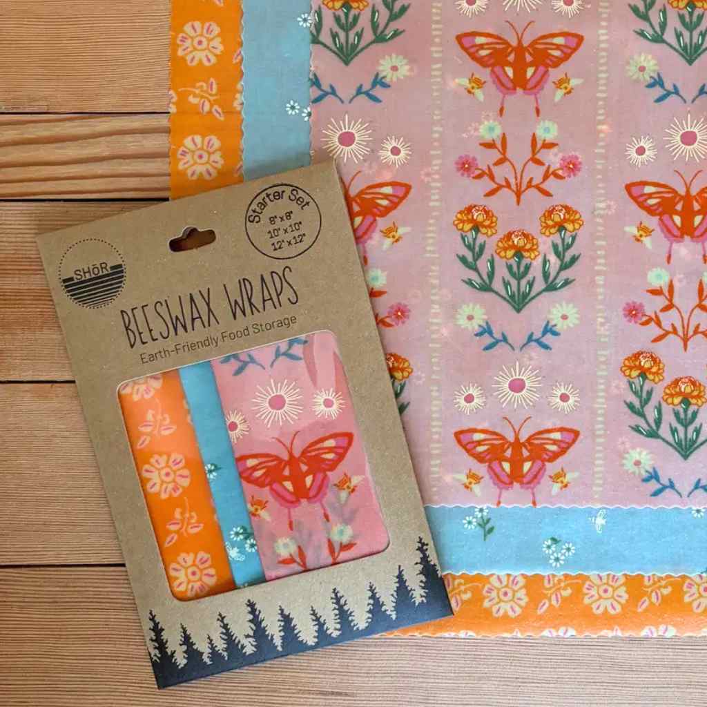 Beeswax wrap set close up on wood background.
