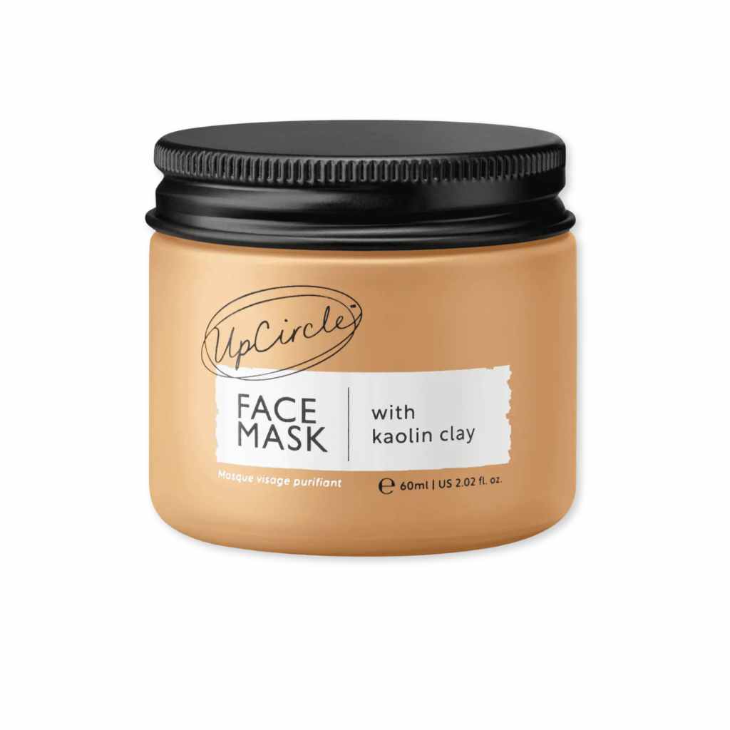 UpCircle face mask jar with black lid on a white background