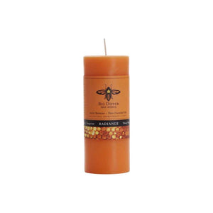 100% beeswax aromatherapy candles made by Big Dipper Wax Works. Small pillar candle in Radiance, orange.