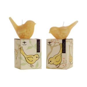 Sculpted Beeswax Candles in the shape of songbirds in two positions, upright and facing down (pecking). Made by Big Dipper Wax Works. Shown sitting on top of their respective boxes