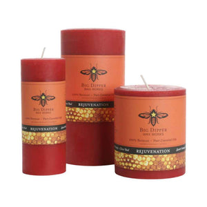Three red pillar candles made by Big Dipper Wax Works in small, medium and large (Rejuvenation)
