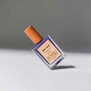VEGAN, 21-Free, 77% plant-based nail polish, BKIND nail polish in Berry Kini purple, woman owned