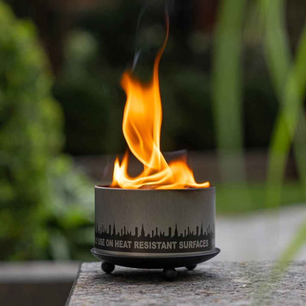 City Bonfires Trivet and Candle Holder, made of heat-resistant wrought iron. Made in USA. 