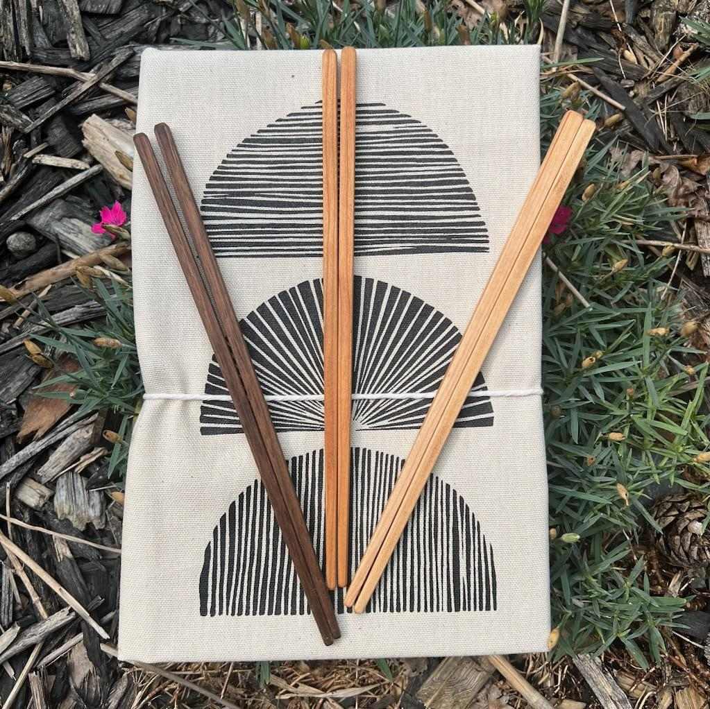 Handmade hardwood chopsticks, set of 3 in three different hardwoods: Maple, Walnut, Cherry. Shown here in a set of three that includes one pair of each. Made in USA by Collin Garrity.