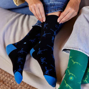 Conscious Step fair trade organic cotton socks that give books - Black with Blue Skeletons design