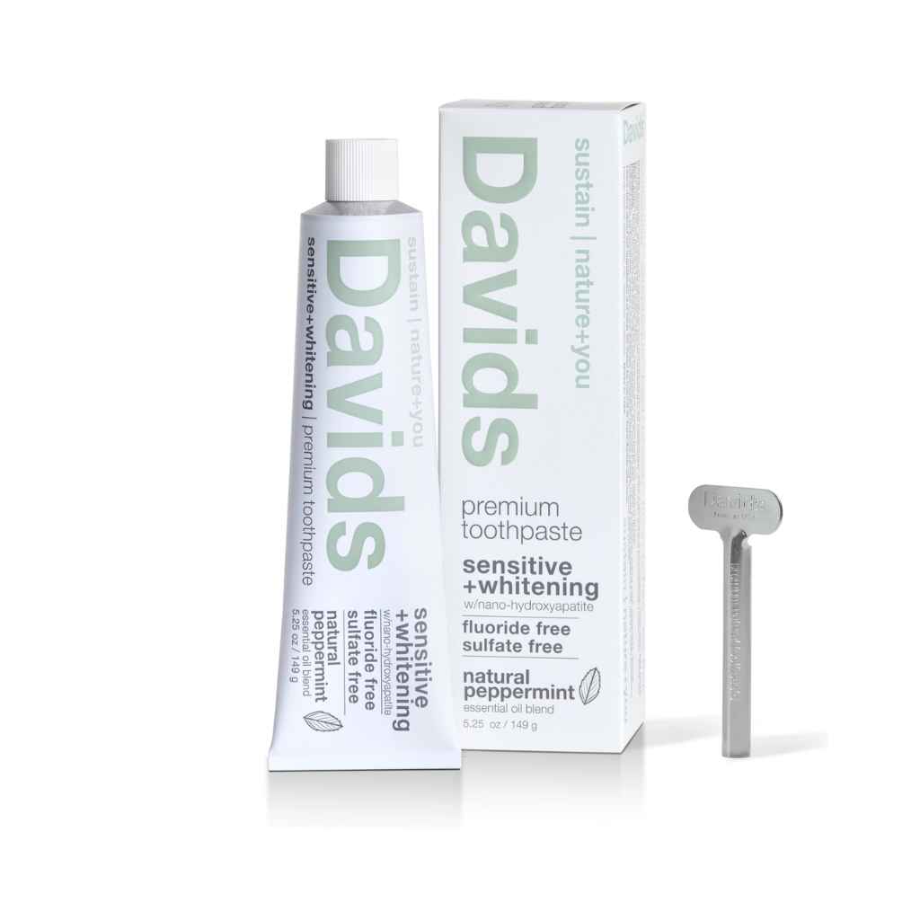 tube of toothpaste with box and metal turn key, Davids Premium Toothpaste 5.25oz in Sensitive + Whitening