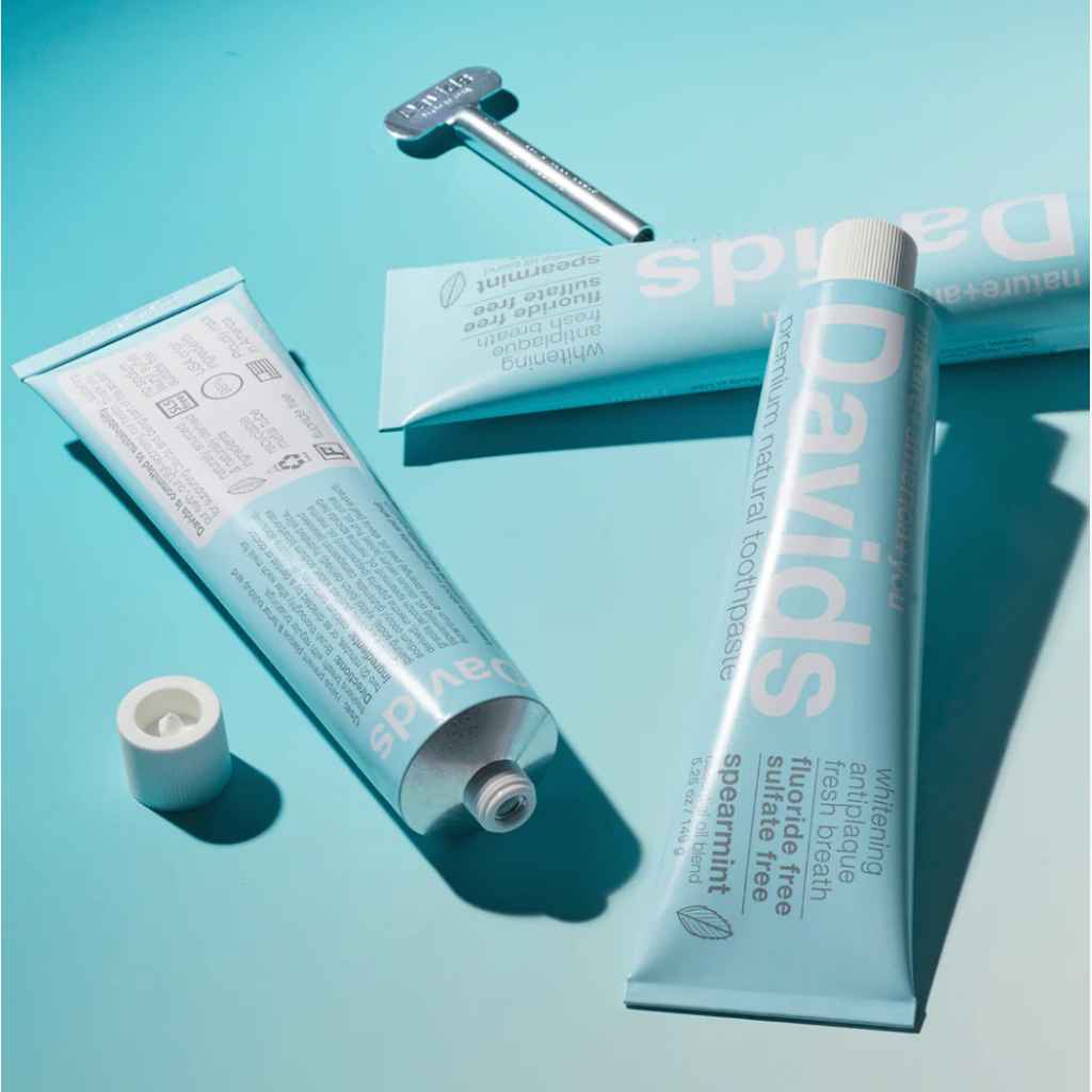3 tubes of toothpaste strewn about - Davids Premium Toothpaste 5.25oz in Natural Spearmint