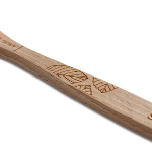 Close-up photo of beechwood toothbrush handles
