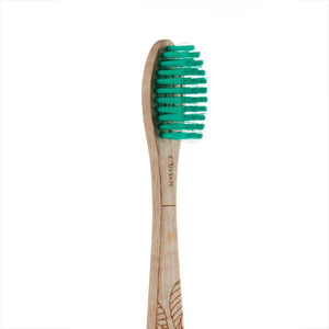 Georganics beechwood toothbrush head shown in green (medium bristles)