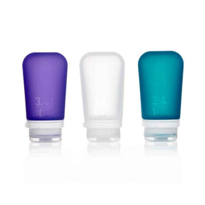 Refillable Silicone Squeeze Bottles for Travel made by humangear - GoToob+ is TSA approved for air travel. Designed in USA. 3-pack includes purple, clear, and teal silicone bottles.