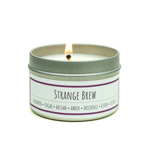 100% All-natural soy candle with hemp wick in tin with lid, Strange Brew scent by Lit Up Candle Co, Rich earthy notes of patchouli, cedar-wood and vetiver with dark amber and exotic balsam sprinkled with cinnamon and sugar. Soy wax, non-toxic, hand crafted candles made in USA. 3oz recyclable tin container with lid.