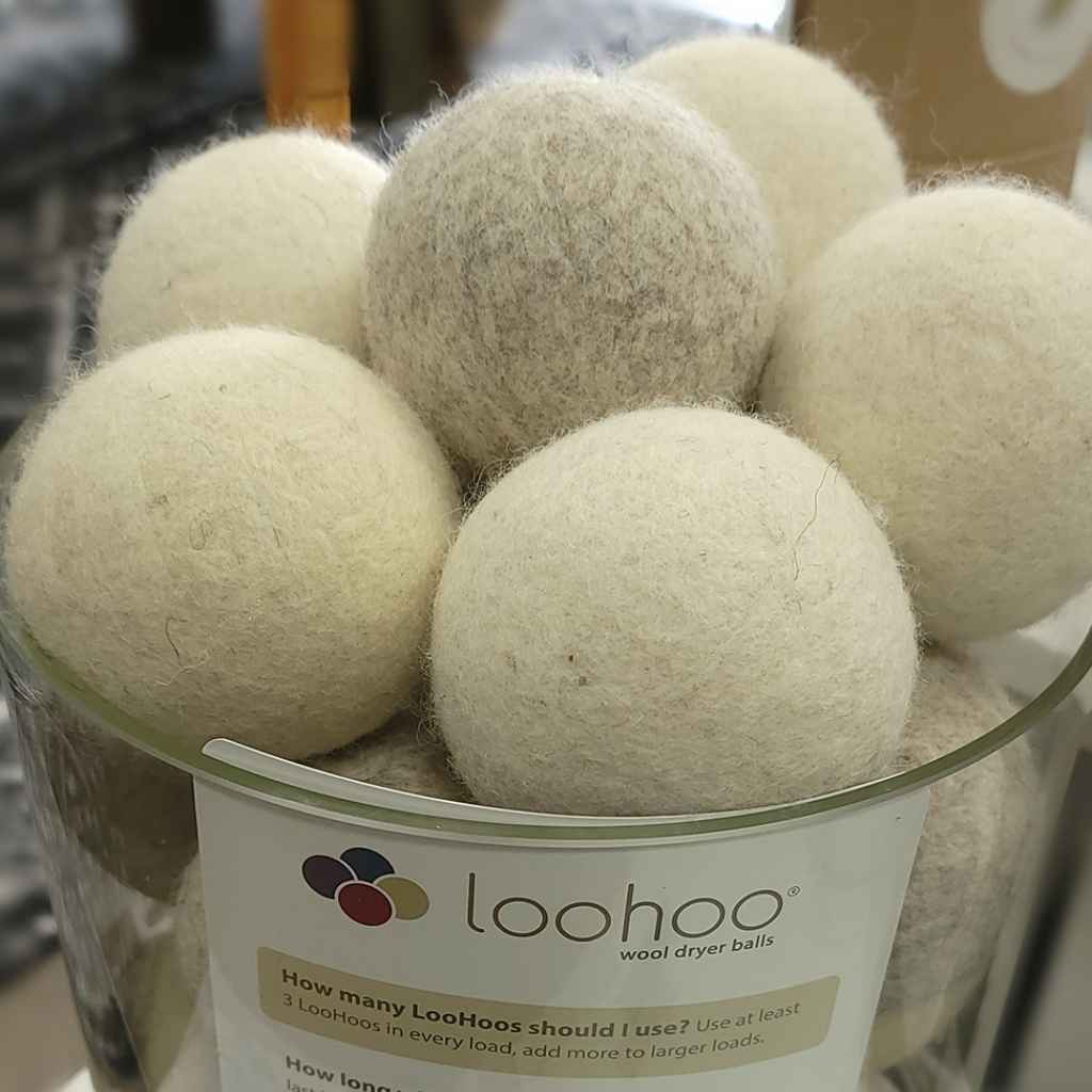 LooHoo all-natural reusable wool dryer balls, fragrance-free, hypoallergenic dryer balls, sustainable laundry. Made in USA.