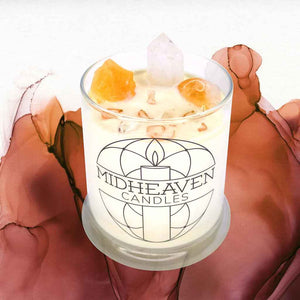 Crystal Intention Candles | Energy & Abundance - a white soy candle with white and orange crystals and a cotton wick. 
