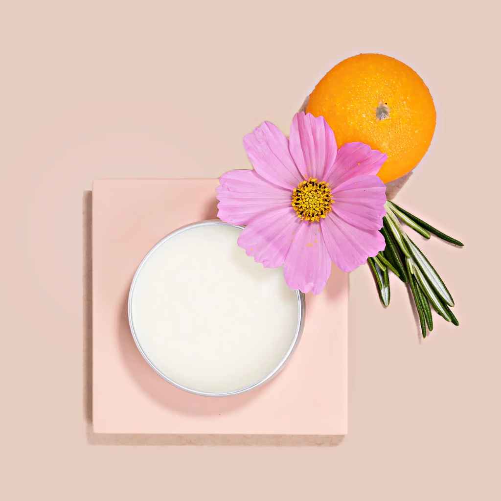 Mona Moon Naturals Hand Balm in Gardeners scent, a blend of patchouli, sweet orange, and rosemary, in 1oz recyclable tin. Made in Rochester, NY, USA.