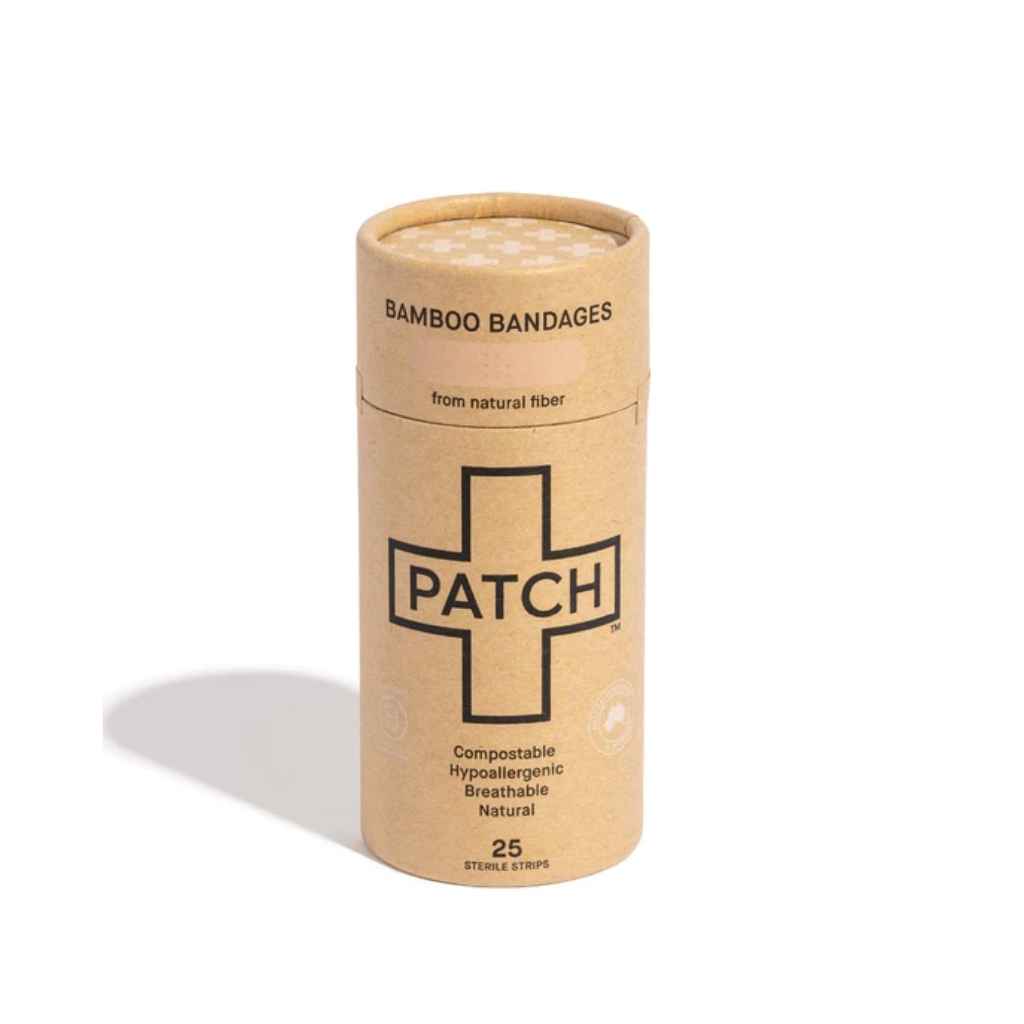 A recyclable paper tube containing 25 bamboo bandages made by PATCH from natural fiber. Compostable, hypoallergenic, breathable, natural bandages.