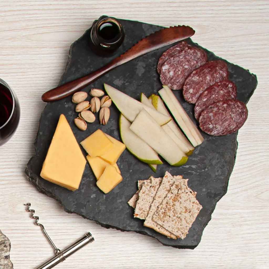 Reclaimed Granite Cheese Board with chiseled edges made by Sea Stones. Handcrafted.