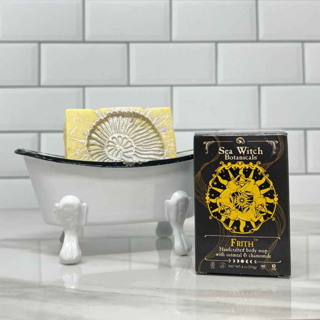 bar of plant-based body soap in black box with yellow design from Sea Witch Botanicals - FRITH nourishing body soap made with oatmeal & chamomile