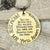 Stamped brass pendant by The Junk Girls, made in USA. 