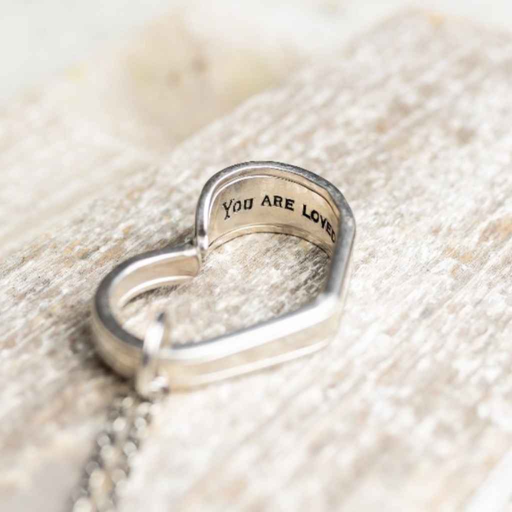 Hand-stamped and hand-crafted silver plate pendant made from upcycled and repurposed vintage cutlery - The Junk Girls, made is USA. "You Are Loved" pendant