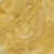 a closeup of gold-colored facial oil
