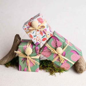 Eco Wrapping Paper by Wrappily - recycled, sustainable gift wrap. Pink and green snails & mushrooms print.
