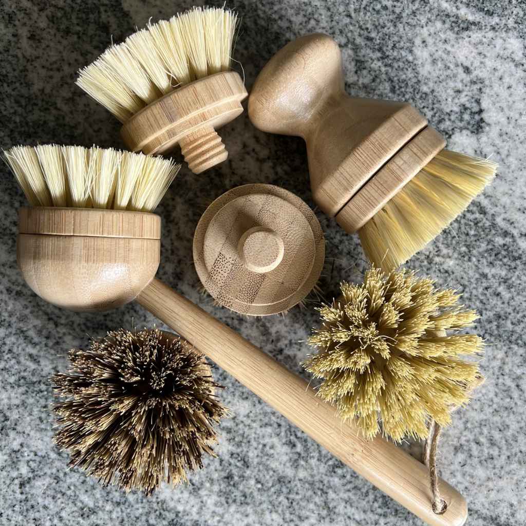 Bamboo Dish Brush with Sisal fiber bristles, shown with optional replacement Palm Fiber bristle brush head, shown with optional replacement heads made of sisal bristles and palm fiber brisltes