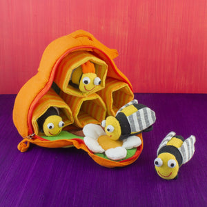 Plush toy, beehive with four toy bees and four hive spaces