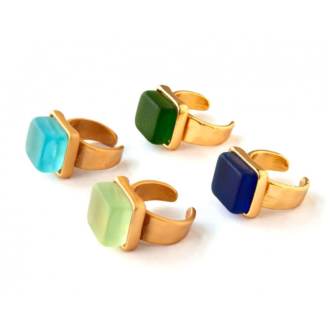 Gold band cocktail rings with square green stone, light blue stone, light green stone and dark blue stone
