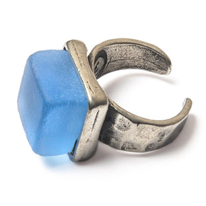 Side view of a blue recycled glass cocktail ring with a square stone and a pewter band