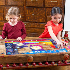 two girls playing with eeBoo Solar System Puzzle, 100 Pieces