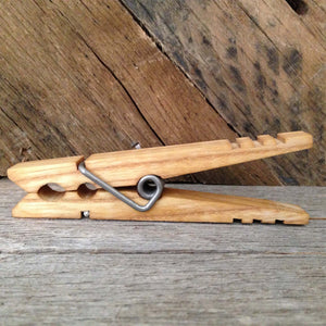 clothespin displayed in front of rustic reclaimed wood