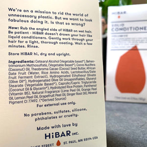 backside of orange conditioner package, shows HiBAR mission statement, directions, and ingredients