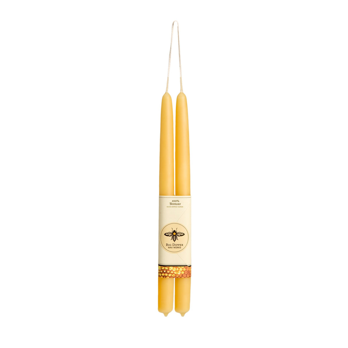 pair of natural colored long taper candles, hung from the wick, wrapped in big dipper logo