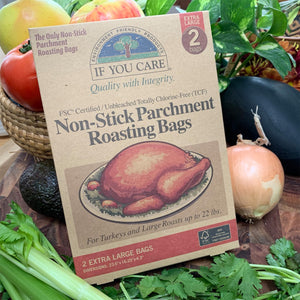 non-stick parchment roasting bags in package. 2 extra large bags. bags are 23.6" x 16.25" x 4.3" displayed on bed of vegetables