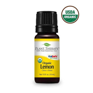 black bottle with yellow label. organic lemon essential oil blend. 10 ml