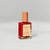 VEGAN, 21-Free, 77% plant-based nail polish, BKIND nail polish in Lady In Red, a rich and creamy scarlet red color