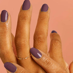 VEGAN, 21-Free, 77% plant-based nail polish, BKIND nail polish in Tiguidou, a dusty purple and dark lavender color