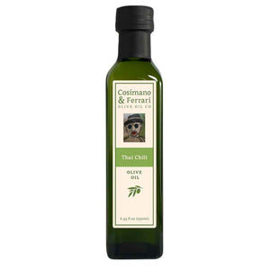 Cosimano & Ferrari Olive Oil Co., 100% Pure Extra Virgin Olive Oil, with all natural Thai Chili flavoring. 8.45 fl oz. Made in USA.