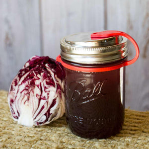 EcoJarz • Reusable drinking jar lid with red pop top.