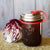 EcoJarz • Reusable drinking jar lid with red pop top.